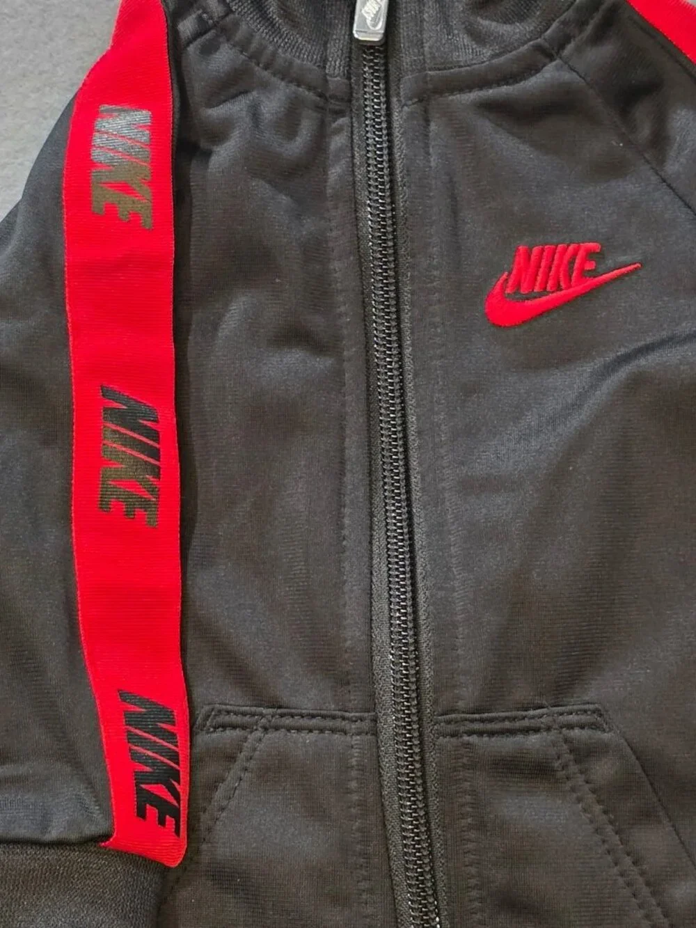 Nike Infant Jumpsuit 6M Black with Red Nike Logo Tape